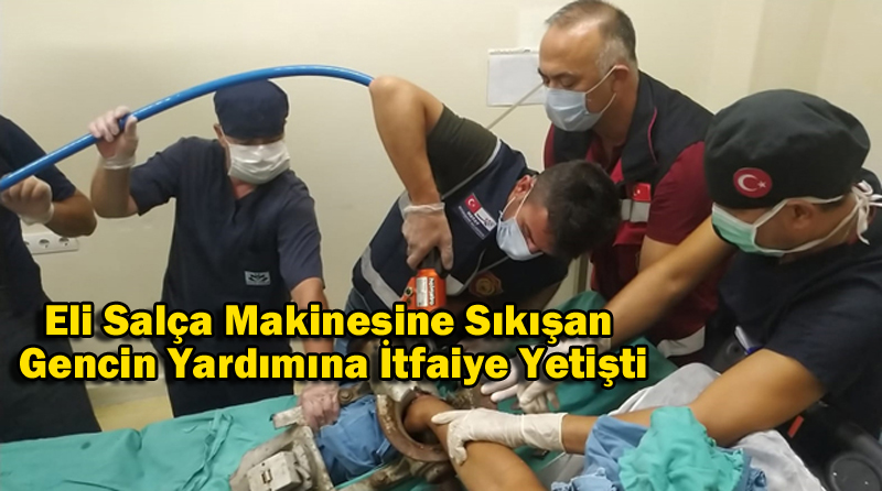 Eli Salça Makinesine Sıkışan Gencin Yardımına İtfaiye Yetişti